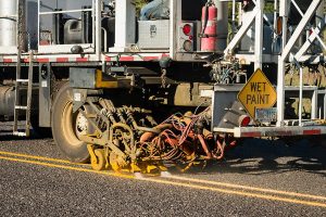 truck painting increased reflective striping on road